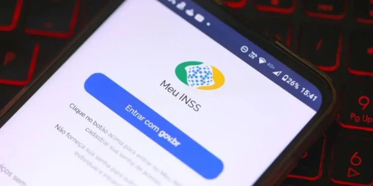 Fachada de uma agência da Previdência Social com logotipo do INSS.